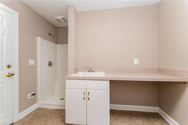 4335 Clovelly Dr, Greensboro, NC 27406 - full bath with a shower, vanity, and tile patterned floors