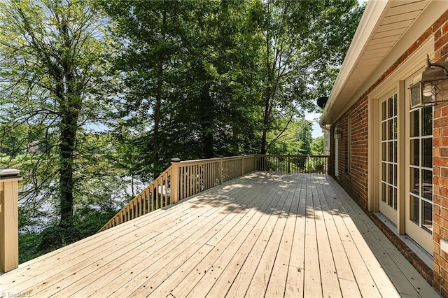 4335 Clovelly Dr, Greensboro, NC 27406 - wooden deck featuring view of scattered trees