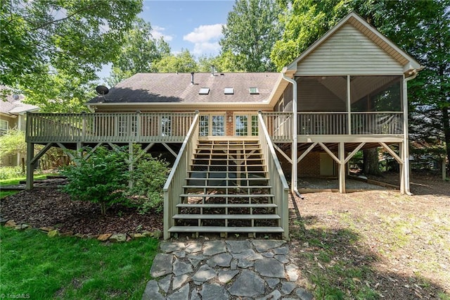 4335 Clovelly Dr, Greensboro, NC 27406 - rear view of property featuring stairs, a sunroom, a wooden deck, and a shingled roof