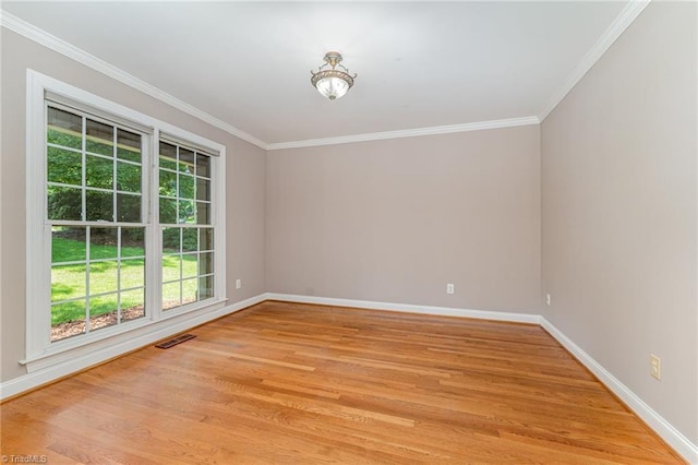 4335 Clovelly Dr, Greensboro, NC 27406 - unfurnished room with ornamental molding and light wood finished floors