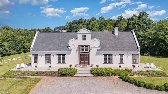 2733 Nebo Rd, East Bend, NC 27018 - view of front facade with a patio area, stucco siding, a chimney, and french doors