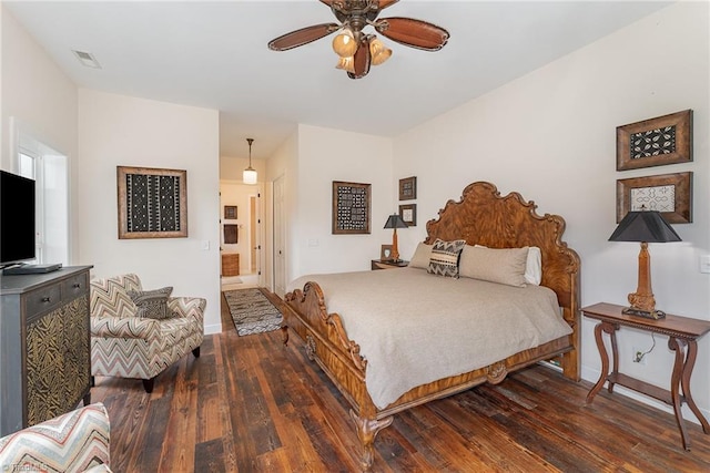 2733 Nebo Rd, East Bend, NC 27018 - bedroom with dark wood-style flooring, ensuite bath, and ceiling fan