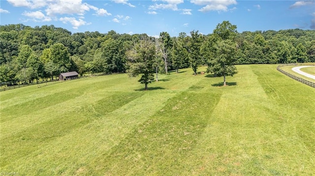 2733 Nebo Rd, East Bend, NC 27018 - view of grassy yard with a wooded view and an outdoor structure