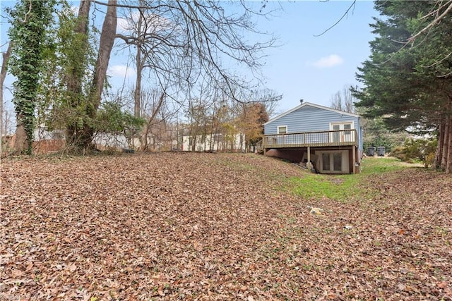 view of yard featuring a deck