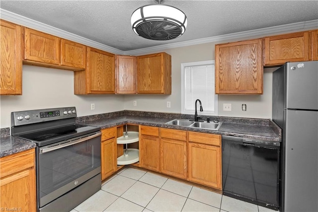 kitchen with sink, stainless steel appliances, crown molding, a textured ceiling, and light tile patterned flooring