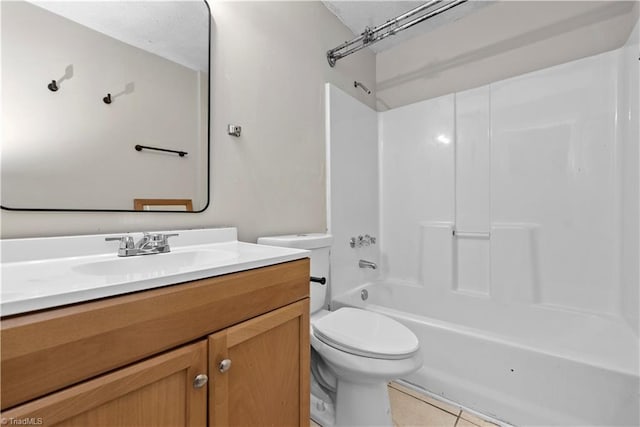 full bathroom with tile patterned floors, vanity, toilet, and bathtub / shower combination