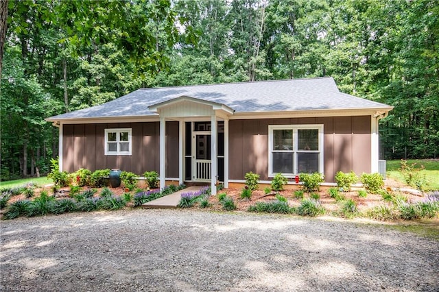 ranch-style home featuring a porch