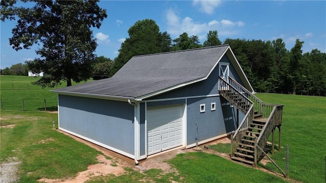 garage with a yard