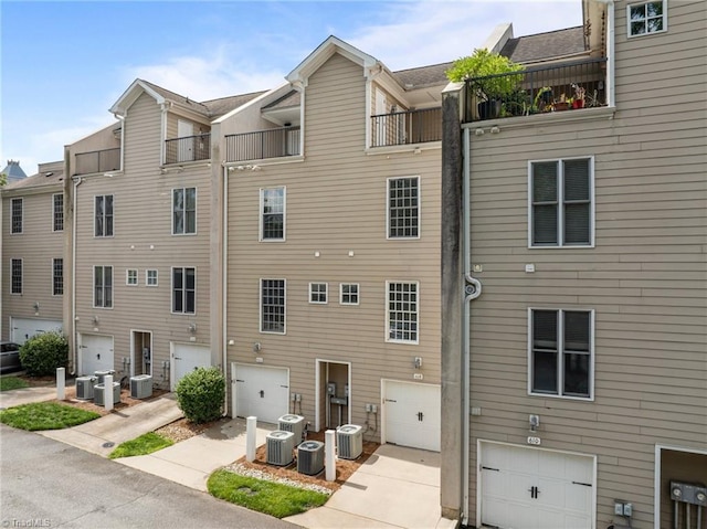 606 Bellemeade St, Greensboro, NC 27401 - view of building exterior with an attached garage