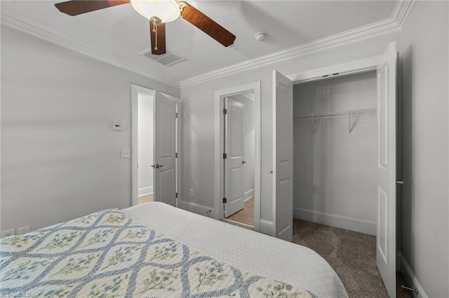 606 Bellemeade St, Greensboro, NC 27401 - bedroom featuring a closet, carpet flooring, crown molding, and ceiling fan