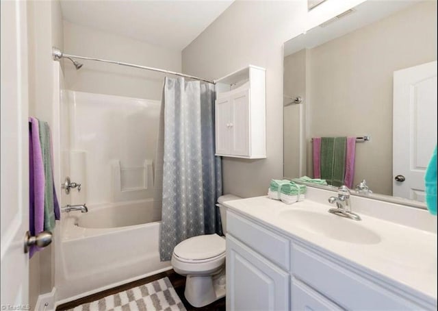 2431 Eagle Creek Ct Unit 203, Winston-Salem, NC 27103 - bathroom with vanity, shower / bath combo, toilet, and visible vents