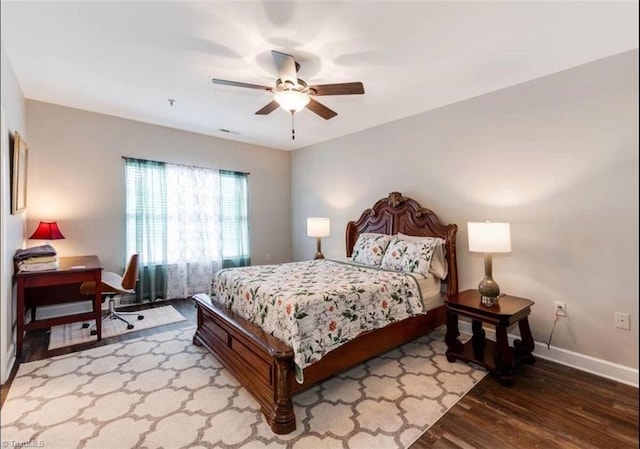 2431 Eagle Creek Ct Unit 203, Winston-Salem, NC 27103 - bedroom featuring baseboards, a ceiling fan, wood finished floors, and visible vents