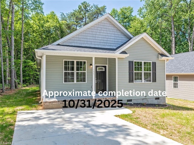 305 E 5th Ave, Lexington, NC 27292 - view of front of home with crawl space, roof with shingles, and a front yard
