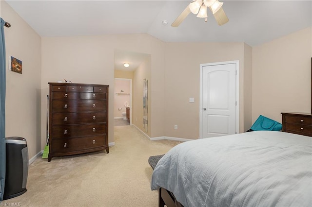 1720 Timber Cove Ct, Winston-Salem, NC 27127 - bedroom with connected bathroom, light carpet, a ceiling fan, baseboards, and vaulted ceiling