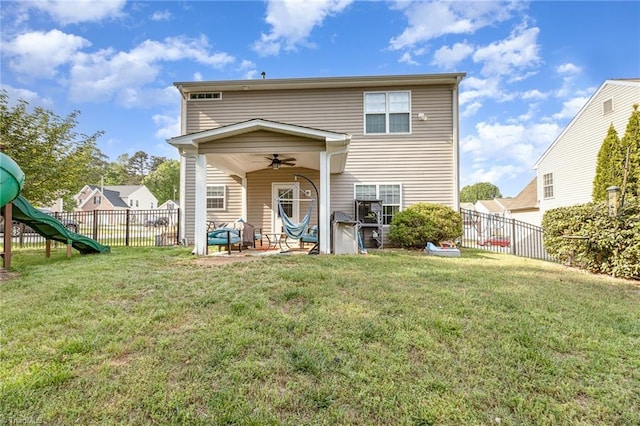 1720 Timber Cove Ct, Winston-Salem, NC 27127 - rear view of property with a patio, a ceiling fan, a playground, and a fenced backyard