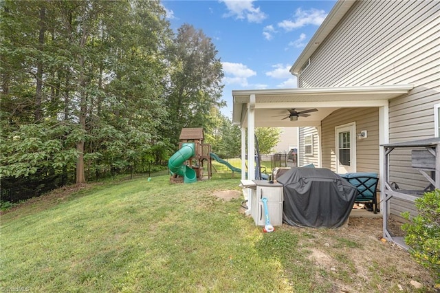 1720 Timber Cove Ct, Winston-Salem, NC 27127 - view of yard with a playground, a ceiling fan, and fence