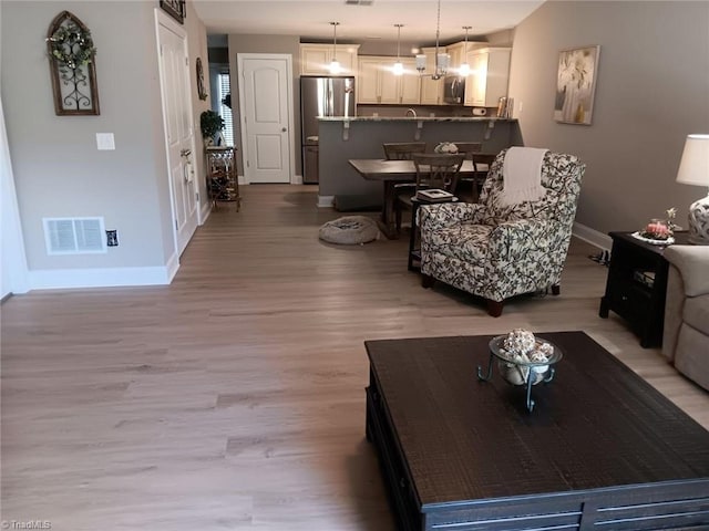 living room with hardwood / wood-style floors