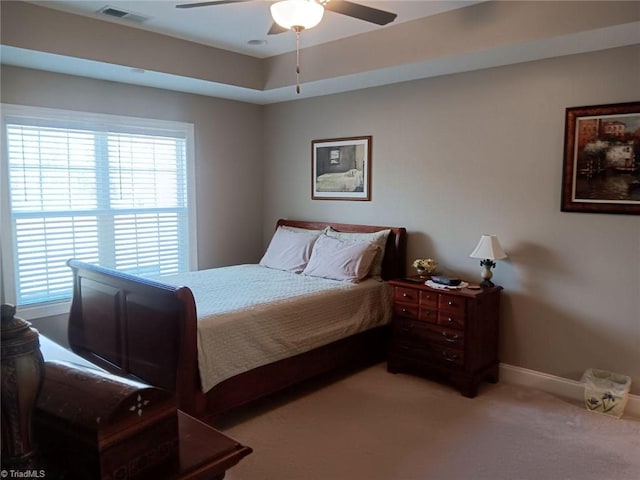 bedroom featuring ceiling fan and light colored carpet