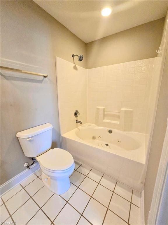 bathroom with toilet, shower / bathtub combination, and tile patterned flooring