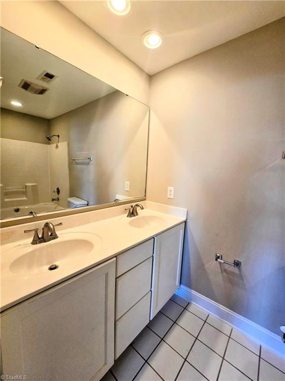 full bathroom with toilet, vanity, bathing tub / shower combination, and tile patterned floors