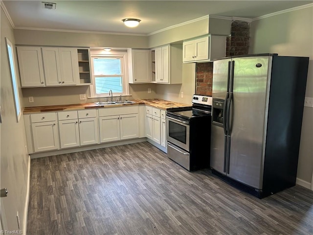 kitchen featuring dark hardwood / wood-style floors, stainless steel appliances, ornamental molding, sink, and white cabinetry