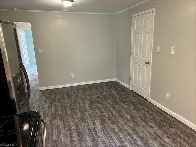 interior space featuring dark wood-type flooring and crown molding