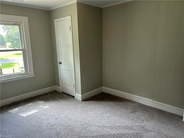 unfurnished bedroom with carpet flooring and ornamental molding