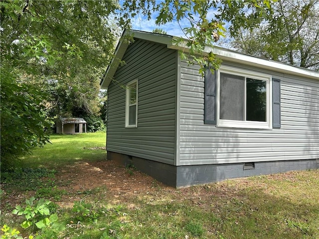 view of property exterior featuring a yard