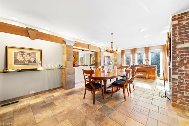 dining room featuring a chandelier