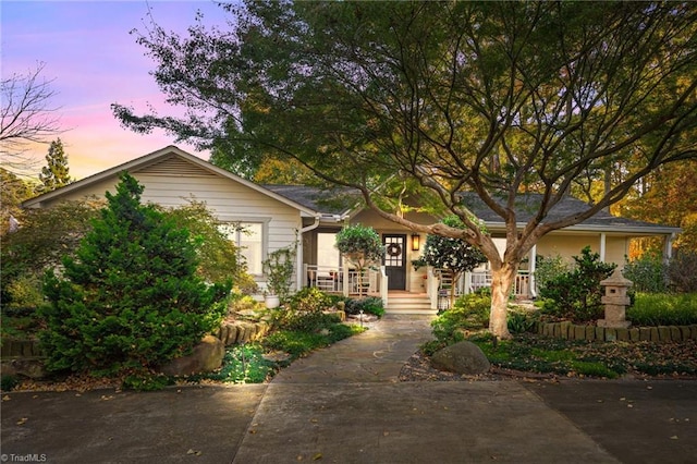 view of front of property featuring covered porch