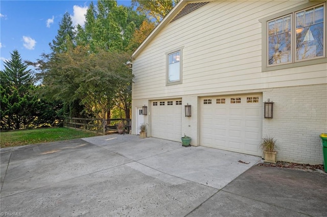 view of property exterior featuring a garage