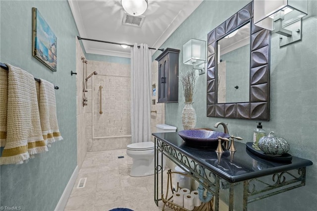 bathroom featuring toilet, tile patterned flooring, a shower with curtain, ornamental molding, and vanity