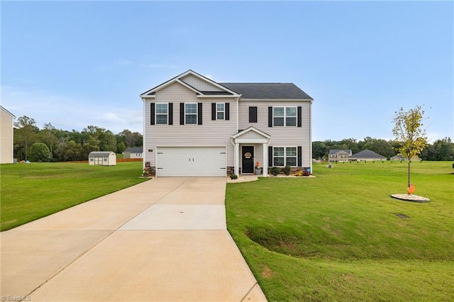 view of front of property with a front yard and a garage