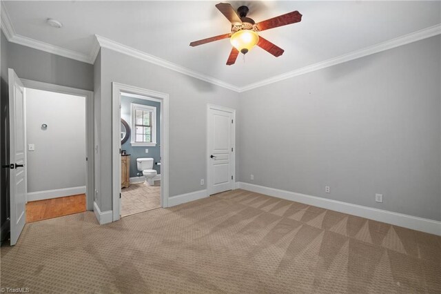 4803 Bluff Run Dr, Greensboro, NC 27455 - unfurnished bedroom with light carpet, ornamental molding, baseboards, ensuite bathroom, and a ceiling fan