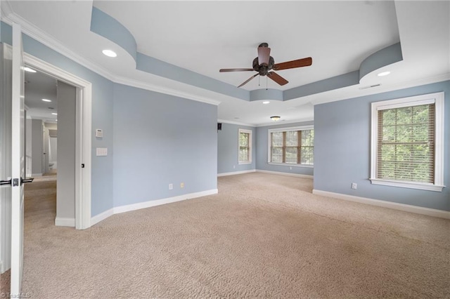 4803 Bluff Run Dr, Greensboro, NC 27455 - carpeted empty room with a ceiling fan, baseboards, crown molding, a tray ceiling, and recessed lighting