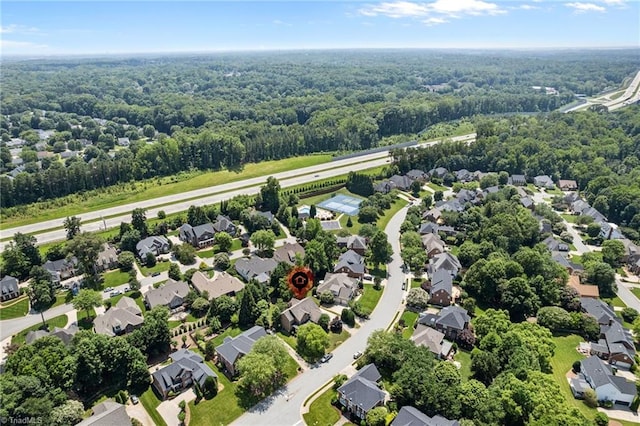 4803 Bluff Run Dr, Greensboro, NC 27455 - aerial view of residential area with a heavily wooded area