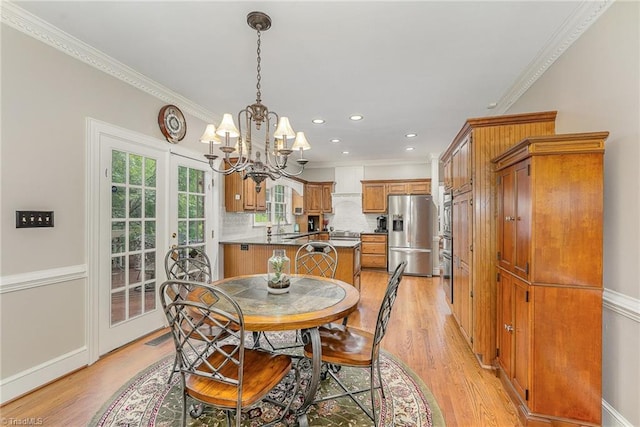5002 Leadenhall Rd, Oak Ridge, NC 27310 - dining space featuring crown molding, a chandelier, light wood finished floors, recessed lighting, and baseboards