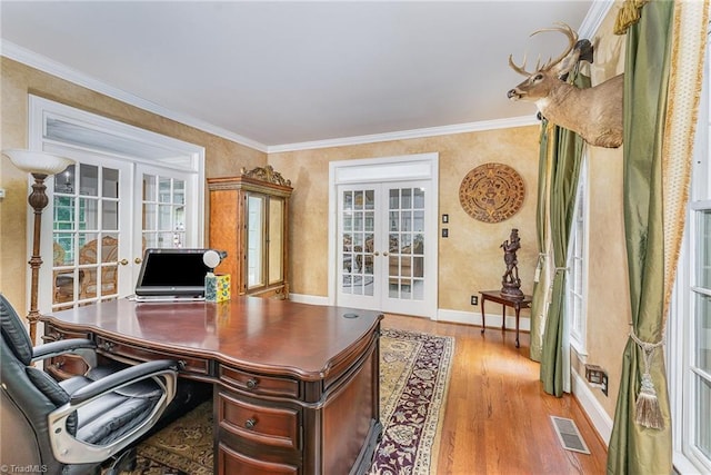 5002 Leadenhall Rd, Oak Ridge, NC 27310 - office with french doors, wood finished floors, ornamental molding, and baseboards