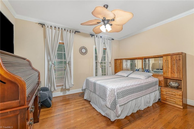5002 Leadenhall Rd, Oak Ridge, NC 27310 - bedroom with baseboards, ornamental molding, light wood-type flooring, and a ceiling fan