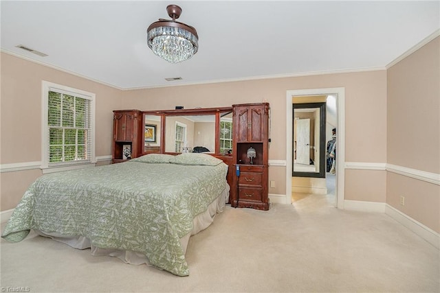 5002 Leadenhall Rd, Oak Ridge, NC 27310 - carpeted bedroom featuring ornamental molding, baseboards, and a chandelier