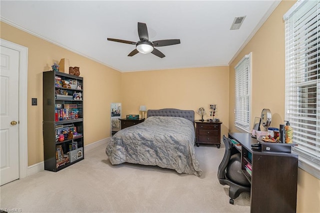 5002 Leadenhall Rd, Oak Ridge, NC 27310 - carpeted bedroom featuring multiple windows, ornamental molding, a ceiling fan, and baseboards
