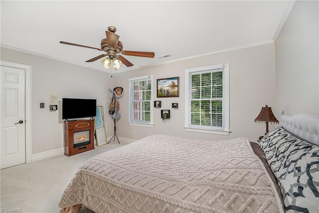 5002 Leadenhall Rd, Oak Ridge, NC 27310 - bedroom featuring baseboards, light carpet, ornamental molding, and ceiling fan