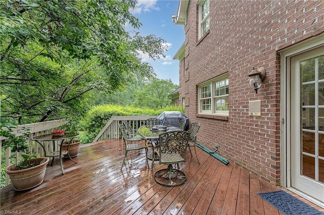 5002 Leadenhall Rd, Oak Ridge, NC 27310 - wooden terrace featuring outdoor dining space and grilling area