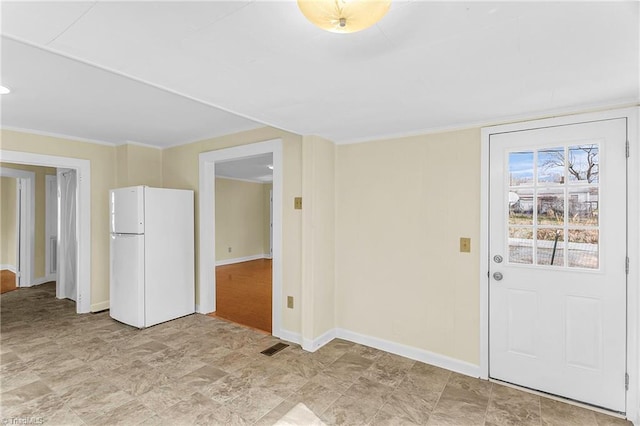 interior space featuring visible vents and baseboards