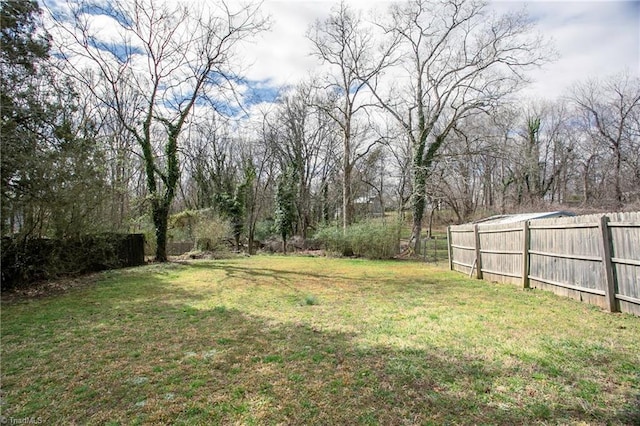 view of yard featuring fence