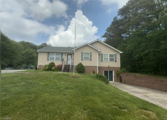 ranch-style home with a front yard