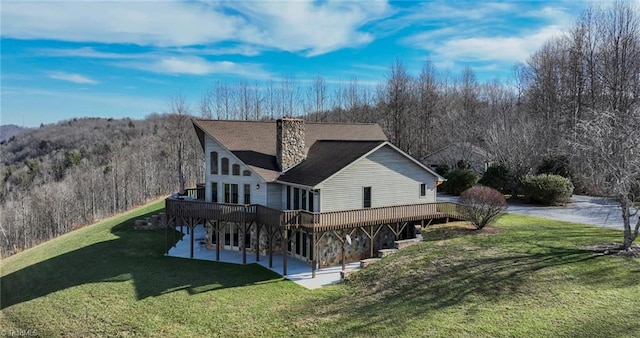 view of property exterior featuring a lawn