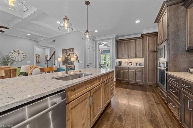 7823 Gatsby Pl, Greensboro, NC 27455 - kitchen featuring stainless steel appliances, dark wood finished floors, light stone countertops, recessed lighting, and pendant lighting