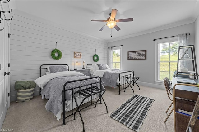7823 Gatsby Pl, Greensboro, NC 27455 - carpeted bedroom featuring crown molding, a ceiling fan, and wood walls