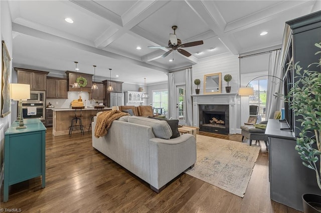 7823 Gatsby Pl, Greensboro, NC 27455 - living area with ceiling fan, coffered ceiling, dark wood-style floors, beam ceiling, and a premium fireplace